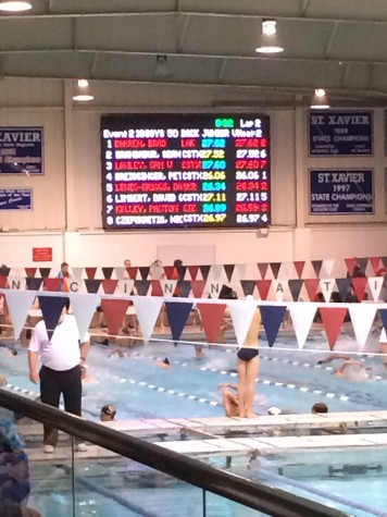 The scoreboard after the 50 Back race.  Sophomore Kelley finished 3rd with a :26.89 time.  Credit: Alex Harrison/@PantherQuill