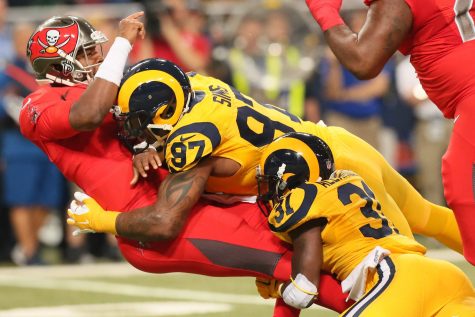 photo from tbo.com Bucs QB Jameis Winston gets hit by Rams DE Eugene Sims and DB Maurice Alexander in a 2015 Thursday night game