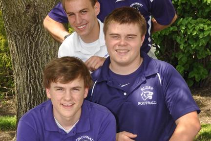 Sam Kwiatkowski (left) and Blaise Weber (right) with Jake Fields (top left); the 2012-13 editors of The Purple Quill.