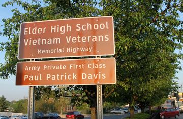 Sign on Glenway Ave that honors Elder graduates who died serving the US in Vietnam has a changeable lower sign to honor a different alum each month.