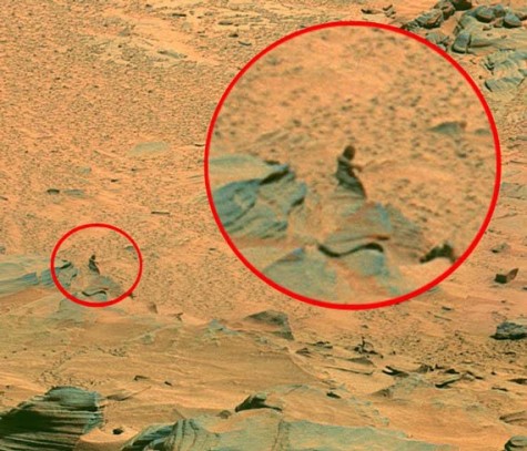 mysterious looking figure lurking around the Mars rocks