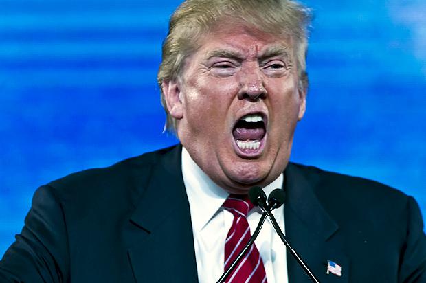 Republican Presidential candidate Donald Trump reacts as he speaks at the 2015 FreedomFest in Las Vegas, Nevada July 11, 2015.
