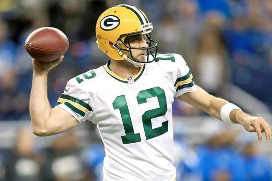 photo from usmagazine.com
Aaron Rodgers throws a pass on a Thursday Night Football game against the Lions in 2015