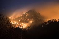 The Smoky Mountains covered by flames.
(photo by WJHL.com)