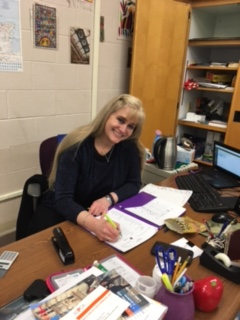 Mrs. Kraeling behind her desk in the classroom she loves at Elder.