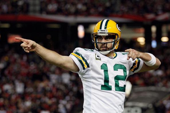 Aaron Rodgers has stepped up and put the Green Bay Packers on his pack while entering the playoffs.