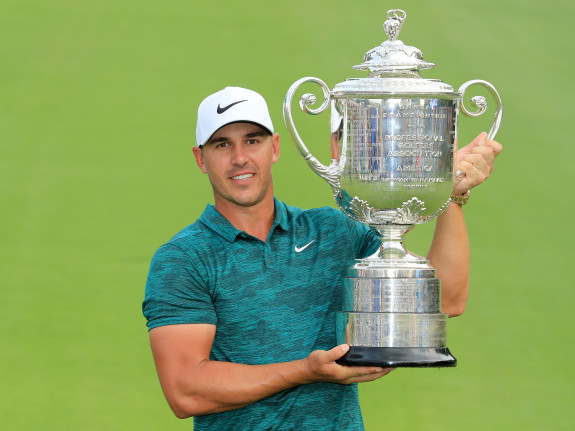ST LOUIS, MO - AUGUST 12:  Brooks Koepka of the United States holds the Wannamaker Trophy after his two stroke victory the final round of the 100th PGA Championship at the Bellerive Country Club on August 12, 2018 in St Louis, Missouri.  (Photo by David Cannon/Getty Images)