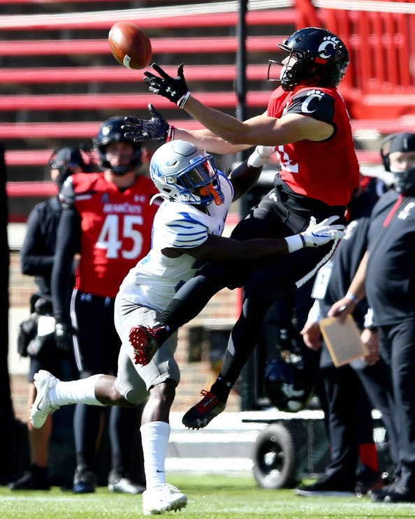 Alan Pierce goes up for the contested catch.