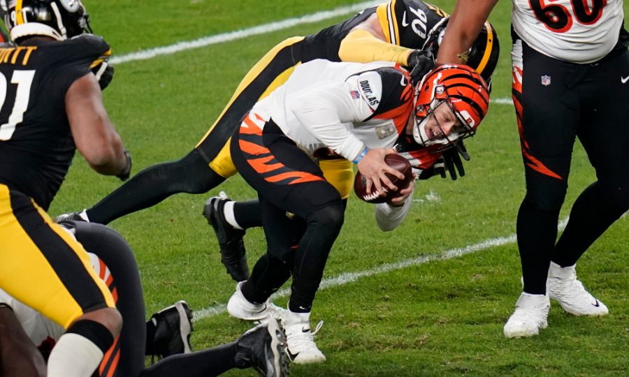 Bengals quarterback Joe Burrow is toppled by T.J. Watt in Week 10 against the Steelers.