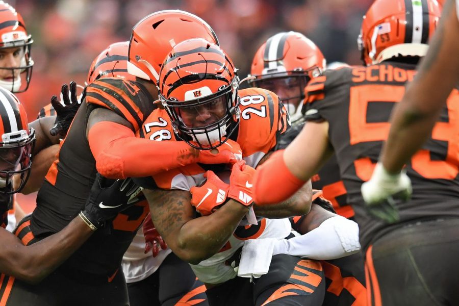 Bengals running back Joe Mixon is swarmed by Browns players in Week 2.