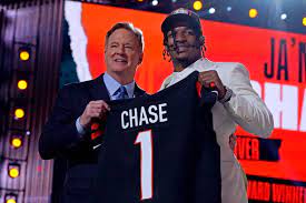 JaMarr Chase with commissioner Roger Godell immediately after being drafted number one by the Bengals.