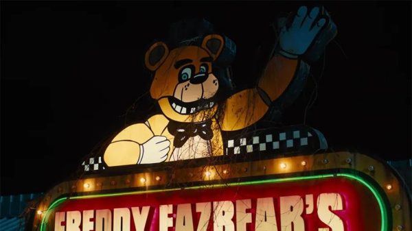 A Freddy sign waves to its incoming victims