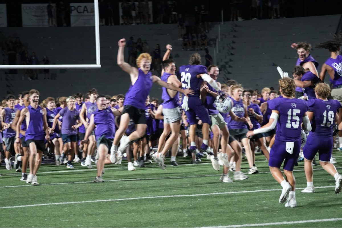 Student body helps celebrate victory over Catholic West in The Pit.