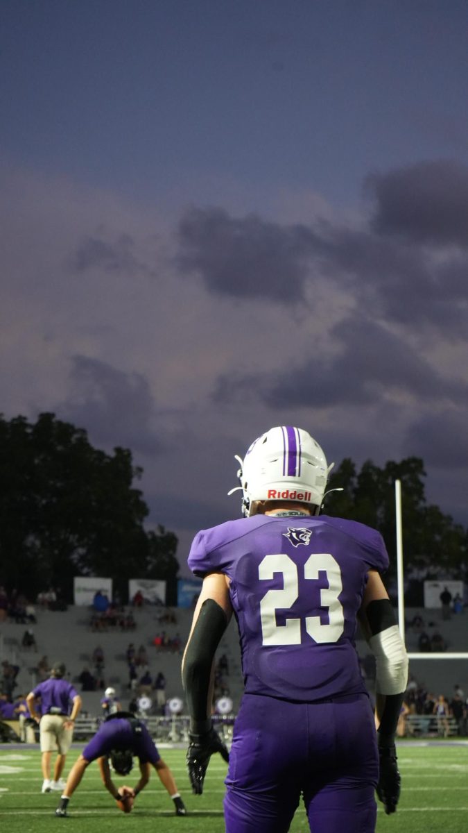 Guidugli warms up the punting leg waiting on the snap from Boeing.