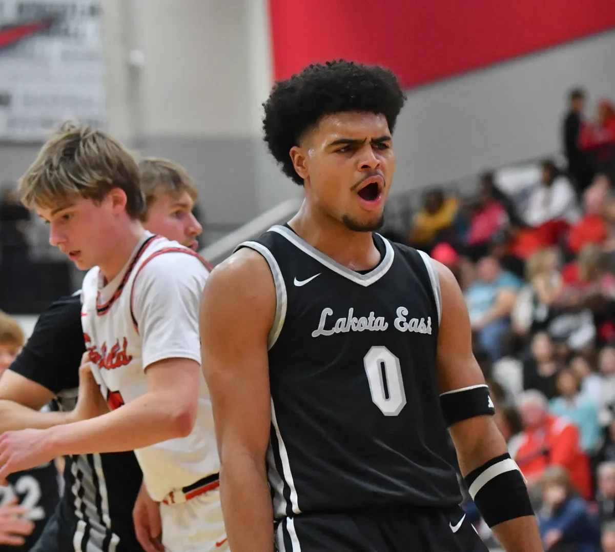 Trey Perry flexes after tough bucket against Fairfield